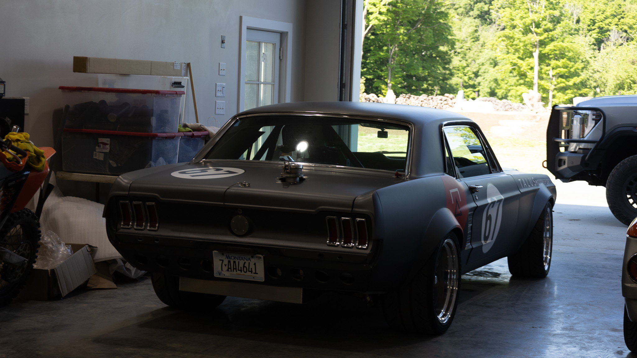 1967 Mustang Coupe rear three-quarter view inside the workshop